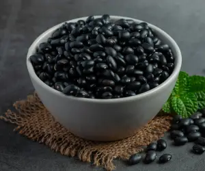 black-beans-white-small-bowl-place-dark-floor